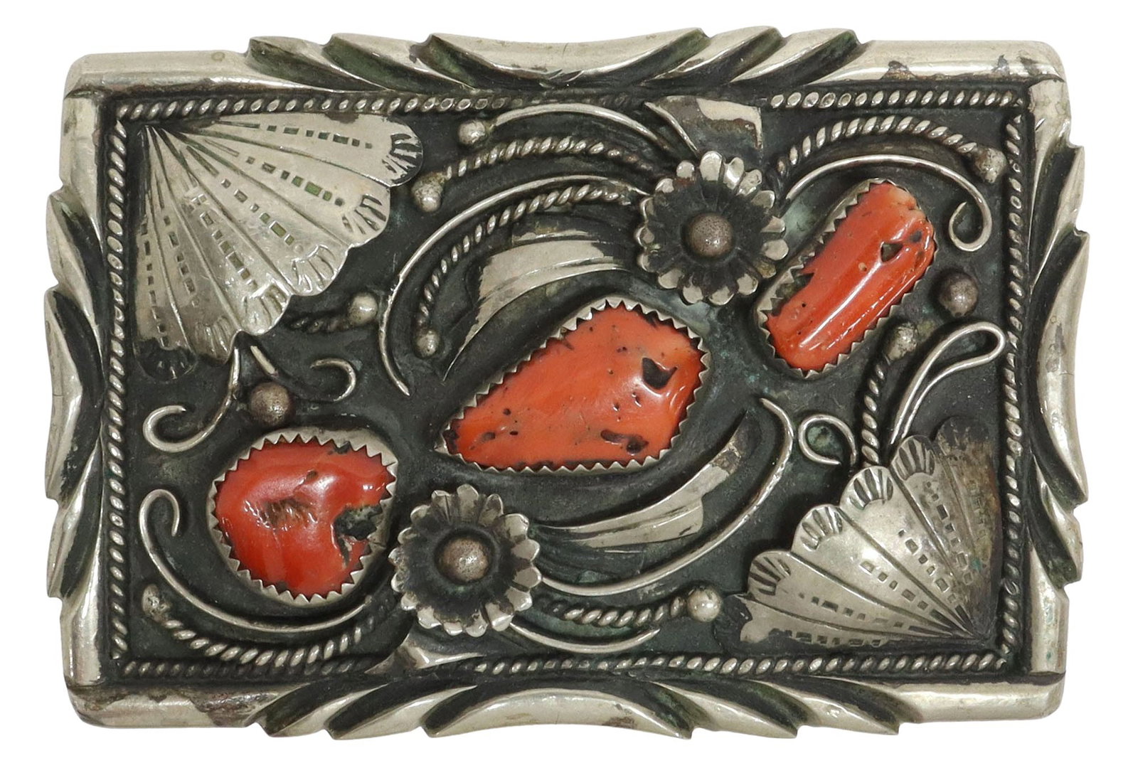 NATIVE AMERICAN NAVAJO SILVER & RED CORAL BELT BUCKLE: Native American silver (content unknown) belt buckle, stamped RY, likely Navajo/ Dine, having three bezel-set red coral accents on a dark ground with floral and fan detail, approx 2"h, 2 7/8