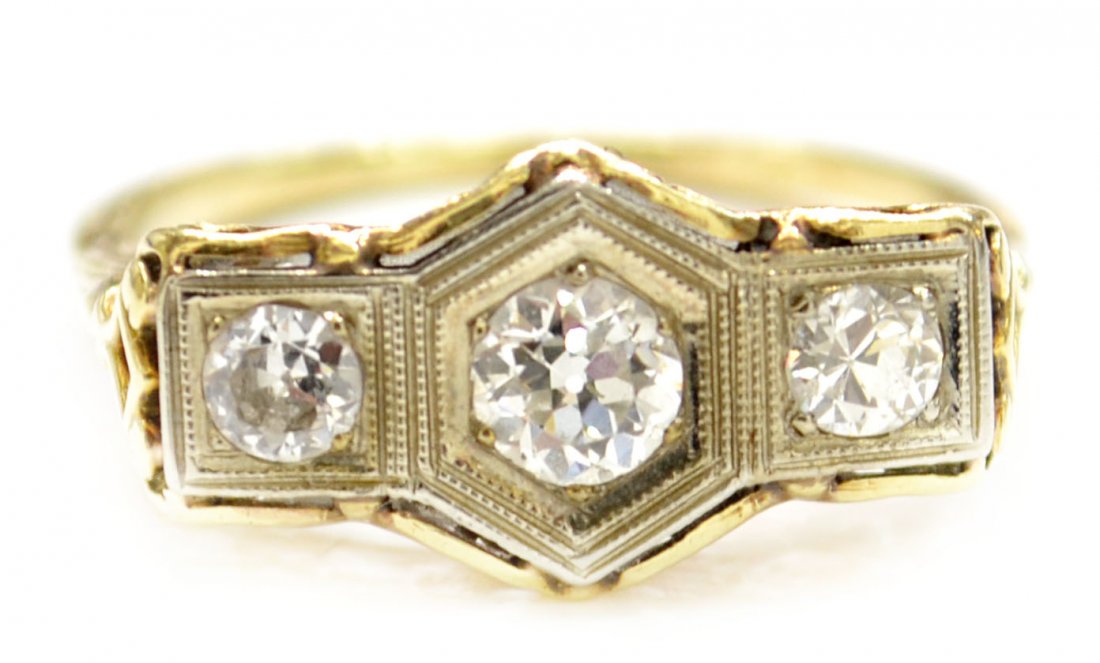 FINE LADIES GOLD & DIAMOND FILIGREE ESTATE RING: Ladies 0.63ct diamond and two-tone gold filigree estate ring, testing concludes mounting is 14kt yellow gold and trim strip is 18kt white gold, appears to have been reshanked, containing: (1) old Euro