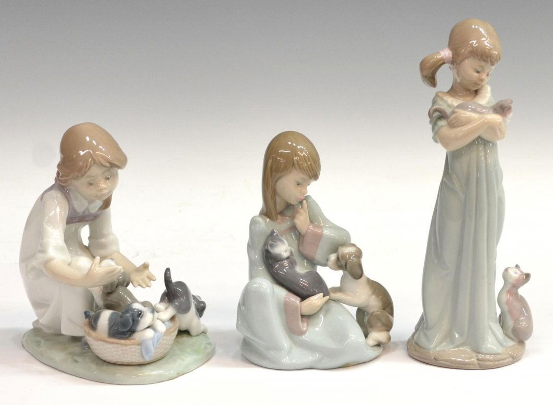 (3) LLADRO PORCELAIN GROUP, CHILDREN, KITTENS: (lot of 3) Collection of Llado porcelain figures, comprising: (1) 'Dont Forget Me', #5743 8.25"h; (1) 'Cat Nap', #5640 5.5"h; (1) 'Joy in a Basket', #5595, 5.75"h; 2.75lbs total Start Price: $100.00