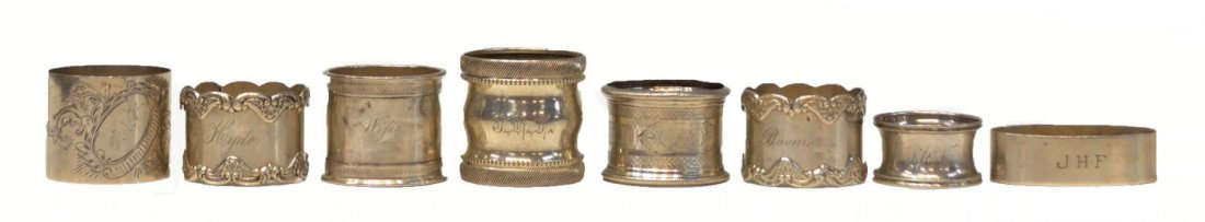 (8) ANTIQUE / VINTAGE STERLING SILVER NAPKIN RINGS: (lot of 8) Collection of antique to vintage sterling silver napkin rings, assorted designs and makers include Towle, Gorham, etc., all with monograms / personalization, denting, 5.07ozt total 4.53ozt 