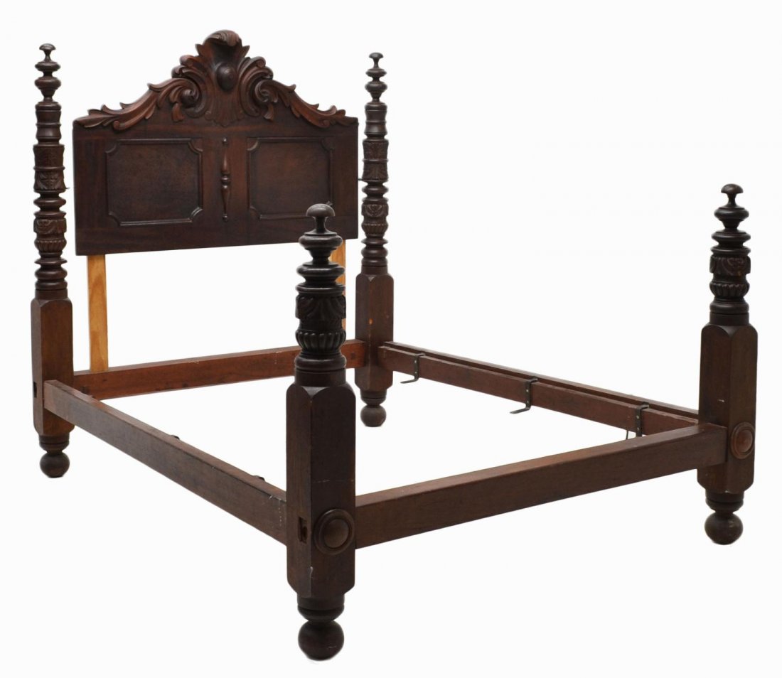 AMERICAN MAHOGANY FOUR POSTER BED: American mahogany poster bed, last half 19th c., the headboard and turned finialed posts with acanthus carving, 64"h, interior 55"w, 72"l Start Price: $200.00