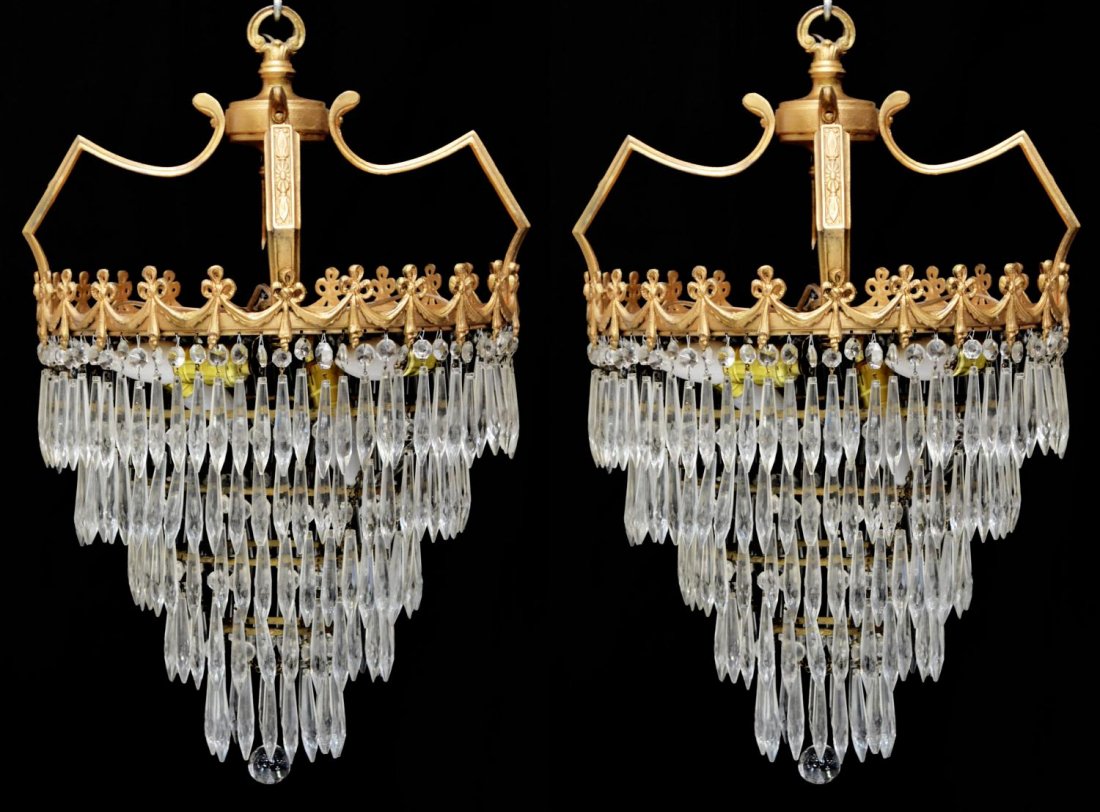 (PAIR) EMPIRE STYLE WEDDING CAKE CHADELIERS: (pair) Empire style light chandeliers, wedding cake, four crystal tiers hung from circular metal canopy, 26"h, 15.75"d Start Price: $400.00