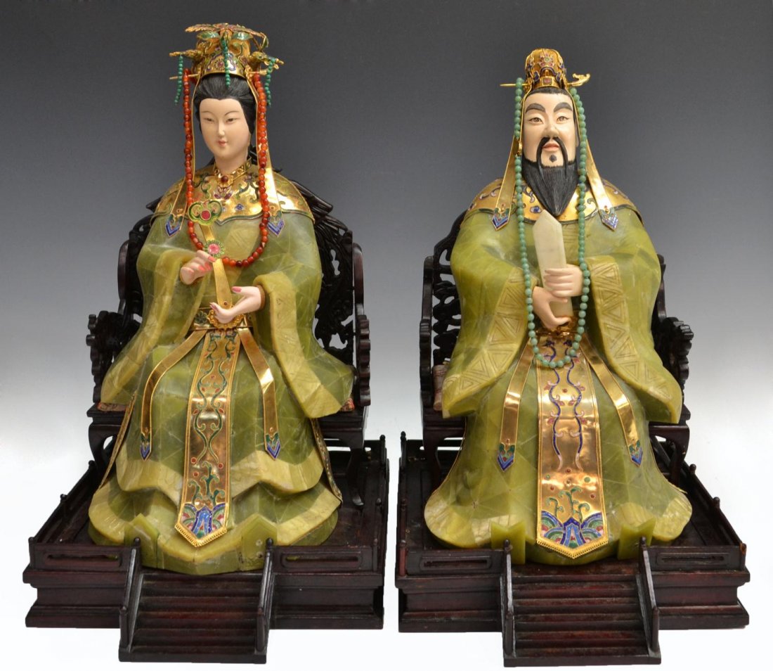 (2) EMPEROR & EMPRESS JADE & GILT METAL FIGURES: (pair) Chinese emperor and empress figures, their bodies made of jade tiles with elaborate enameled gilt metal ceremonial decorations including reticulated crowns, the empress holding a ruyi scepter, 