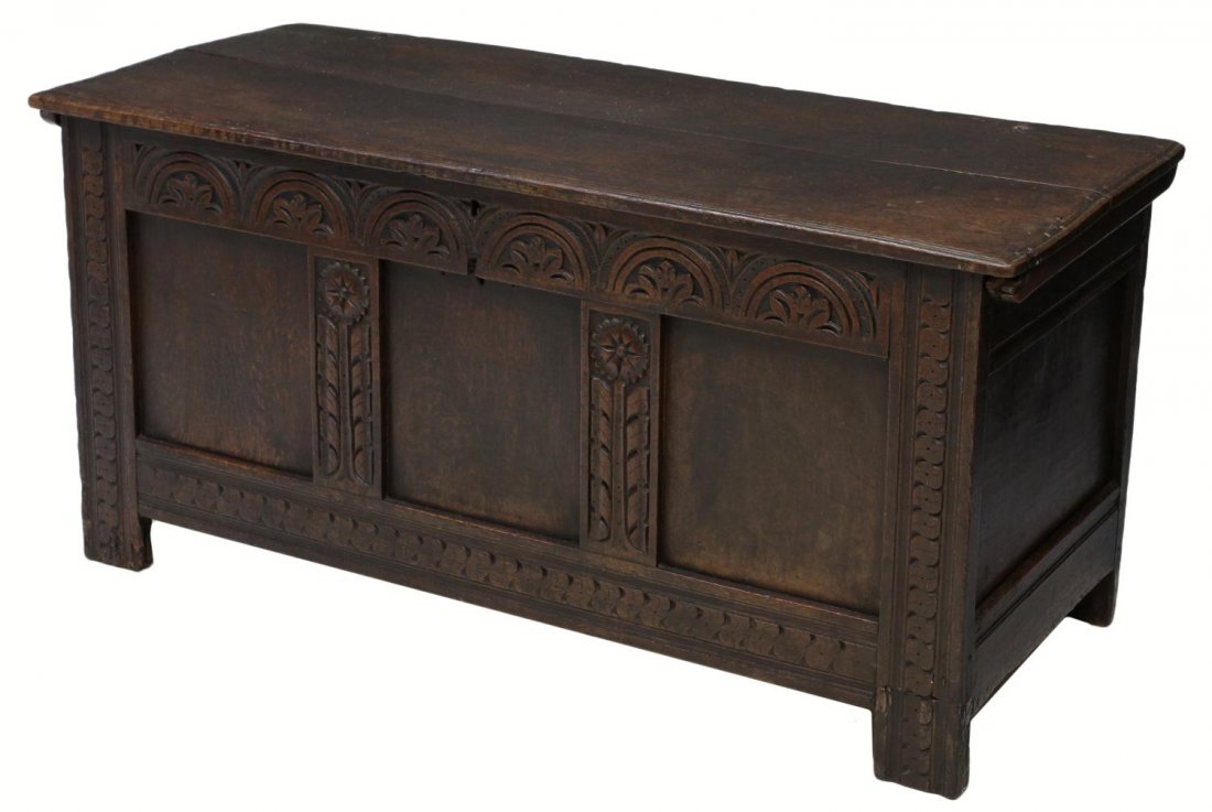 FRENCH CARVED FRONT STORAGE TRUNK: French oak storage trunk, 19th c., the front with foliate and geometric carving, a hinged top opening to the interior with mounted lift top storage box, 23.75"h, 49.75"w, 20"d Start Price: $100.00