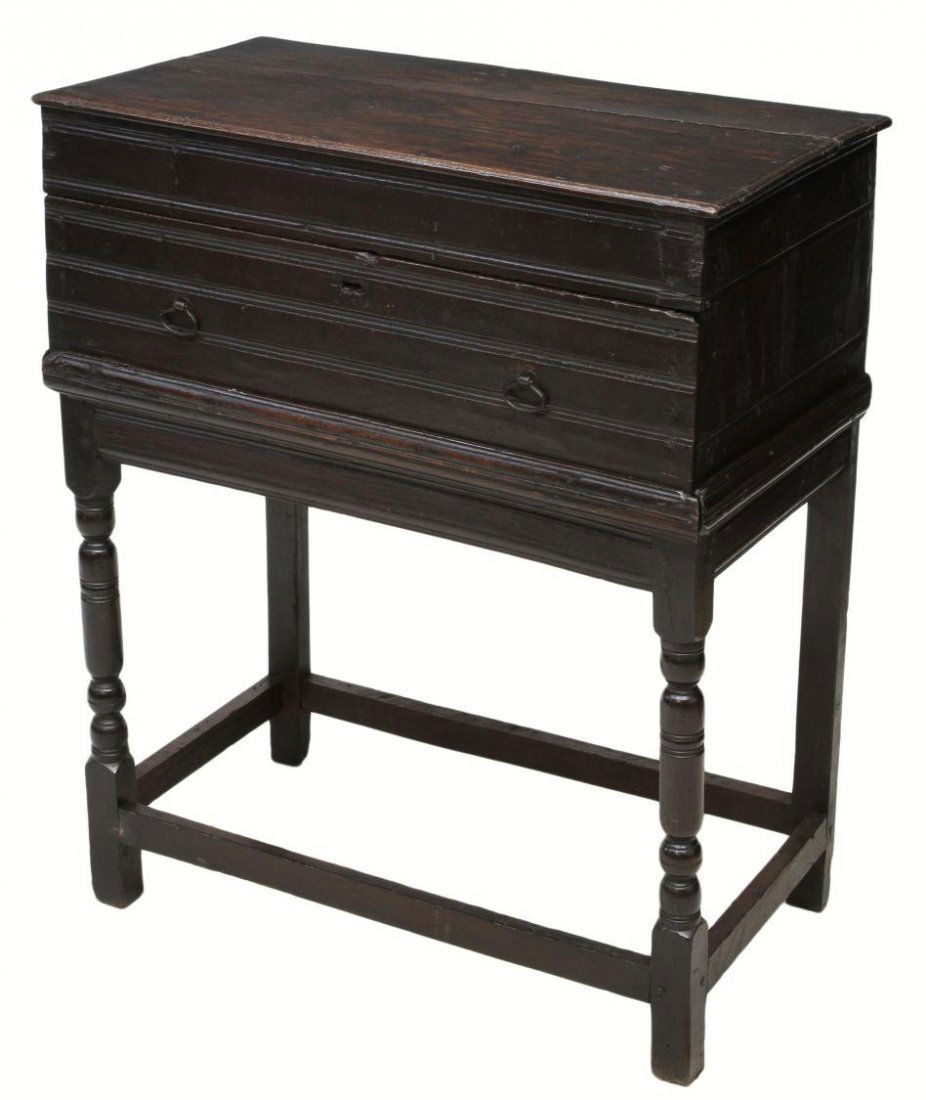 ANTIQUE OAK CHEST ON STAND: Antique oak chest on later stand with single drawer, original primitive lock, rising on turned legs joined by stretchers, 37.5"h, 31.5"w, 17.25d Start Price: $100.00