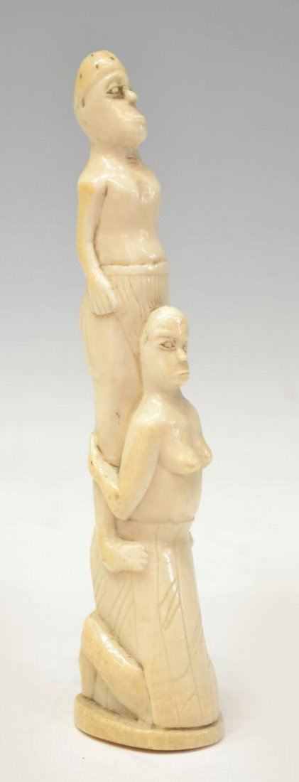 AFRICAN IVORY TUSK CARVING, TRIBAL FIGURE TOTEM: *International shipping is not available on this lot* African ivory tusk carving, a tribal figure totem of male and female figures, 8"h, .75lb ** Provenance: From the San Anselmo Estate of a Danish Di