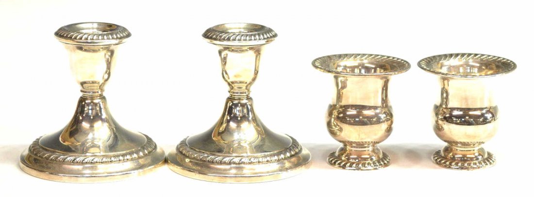 (4)STERLING TOOTHPICK HOLDERS &GORHAM CANDLESTICKS: (lot of 4) American sterling silver table items, comprising: (2) National sterling silver toothpick holders, having gadrooned trim, in the 'H1656' pattern, 2.75"h, 2.5"diam, 2.592ozt.; (pair) Gorham w
