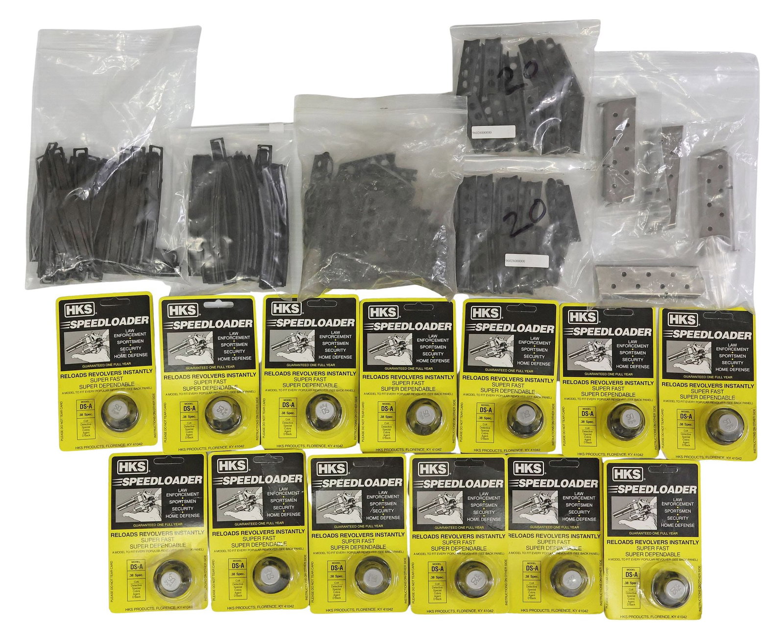 FIREARM ITEMS, 1911 MAGS, STRIPPER CLIPS, SPEED LOADERS: (lot) Firearm Items: (4) Colt Officers 1911 magazines, each marked at the base "Colt 45 Auto, each 7 round; (approx.110) Stripper clips, one group of 25 marked for Enfield .303; (1