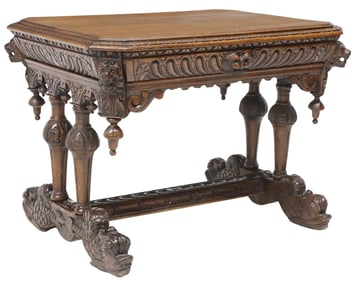 FRENCH RENAISSANCE REVIVAL CARVED OAK WRITING TABLE