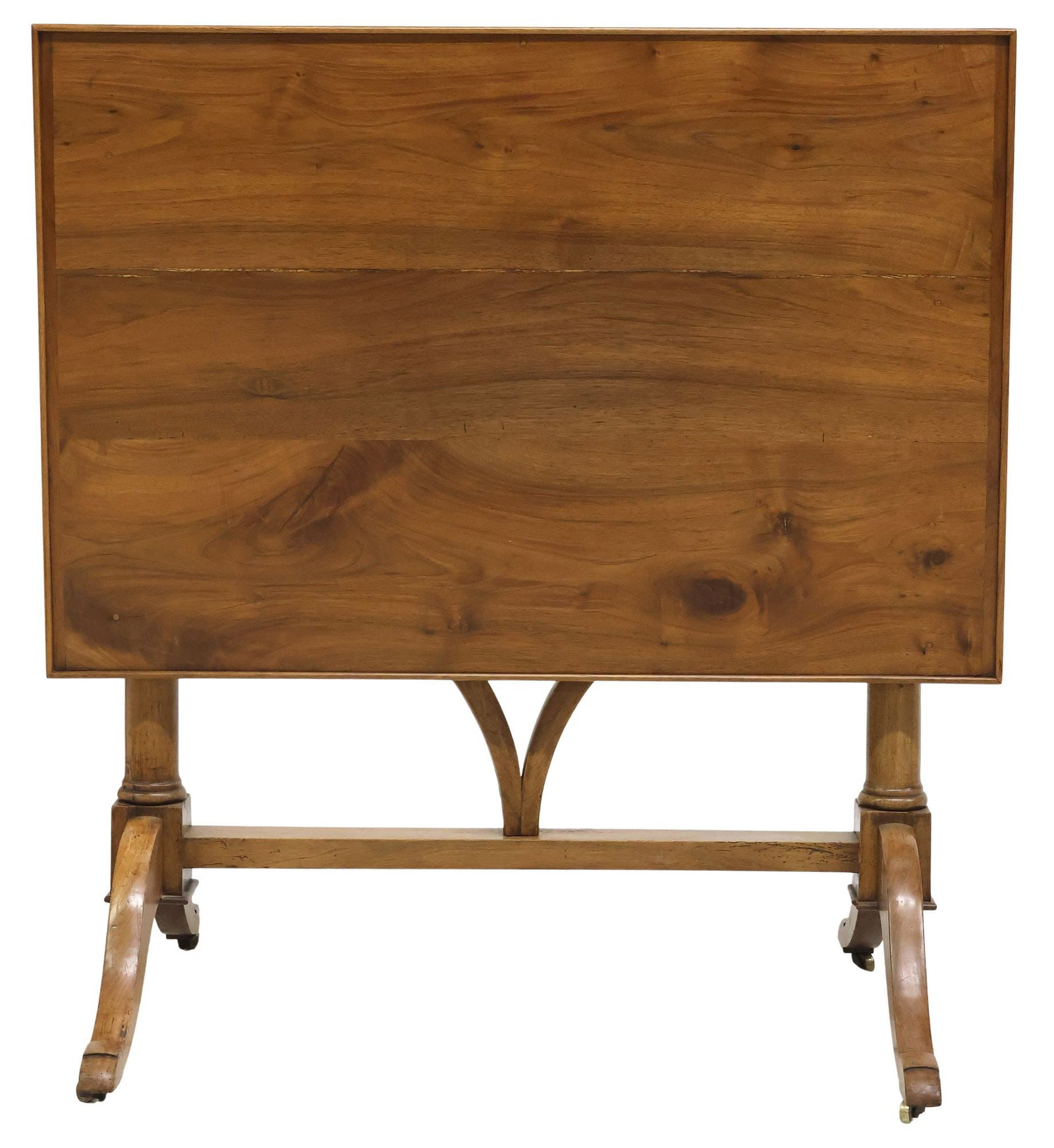 FRENCH WALNUT TILT-TOP WINE TABLE: French walnut vineyard (vigneron) table, 19th c., rectangular top with molded edge, turned columnar supports, swing harp-form support, scrolled legs on casters, top down: approx 27.25"h, 39&