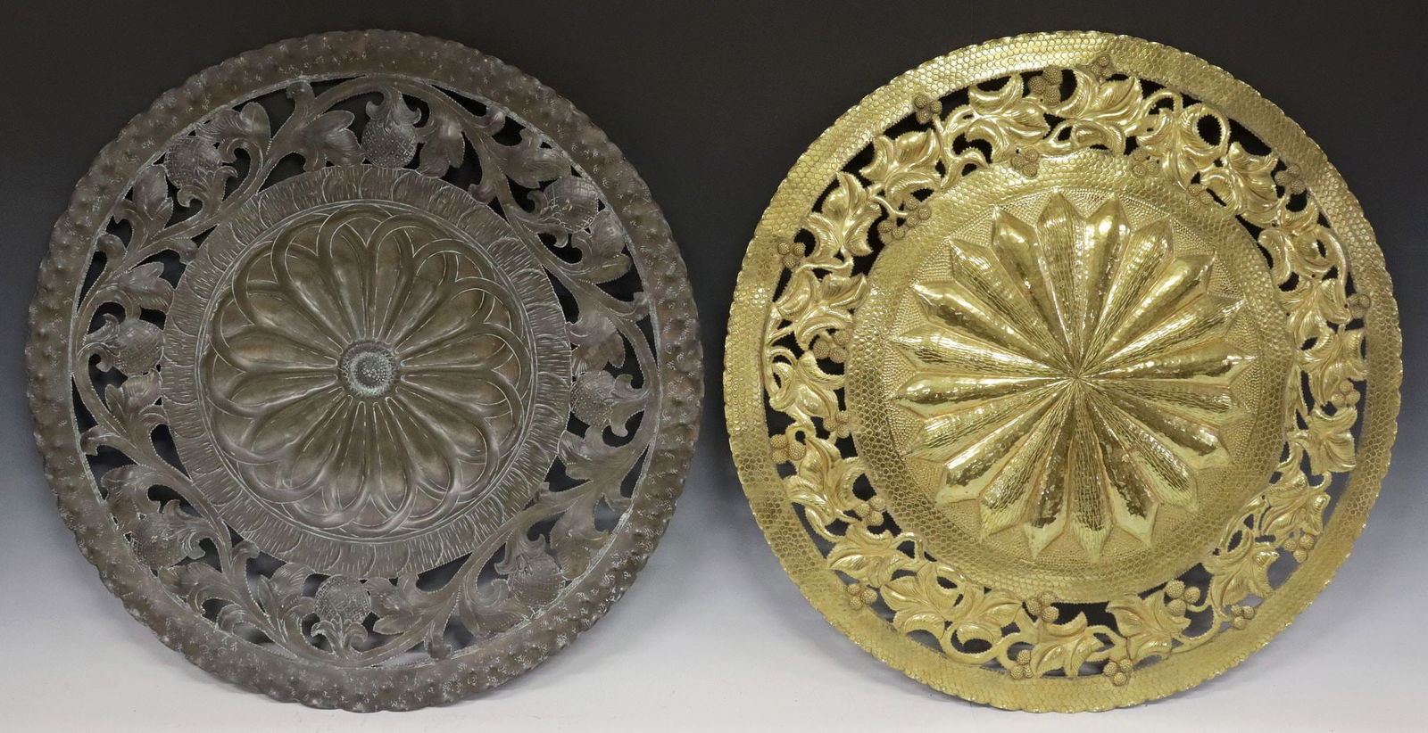 (2) EGIDIO CASAGRANDE (1911-1962) BRASS & PATINATED METAL WALL CHARGERS: (lot of 2) Italian metal wall chargers, Egidio Casagrande (1911-1962), both with scalloped rim and a pierced trim of scrolling foliates bearing fruits, each retaining partially obliterated maker