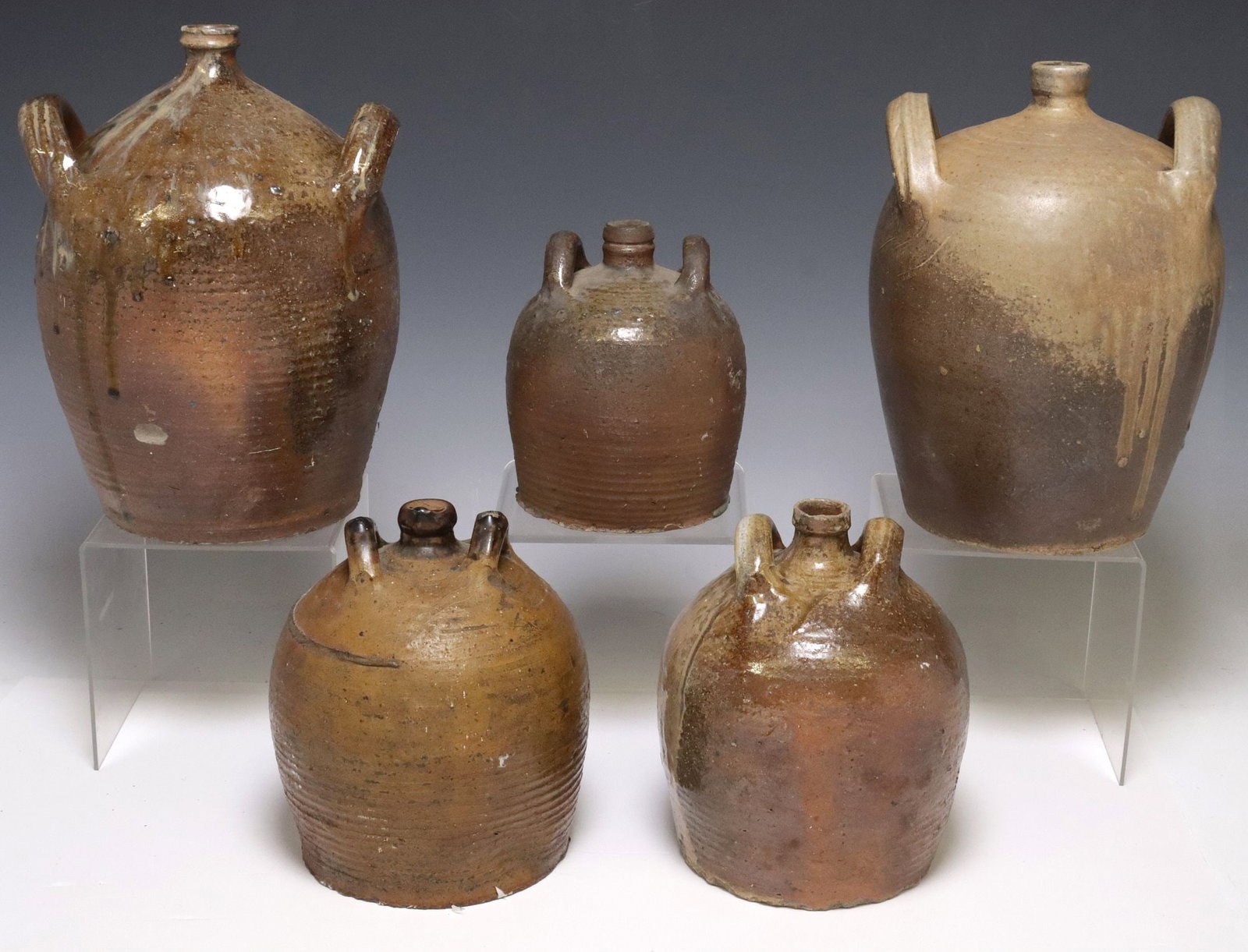 (5) FRENCH PROVINCIAL STONEWARE OIL JUGS: (lot of 5) French Provincial stoneware oil jugs, each having dual rolled handles and narrow spout, largest: approx 12.5"h, 7.5"diam, 24.5lbs total 