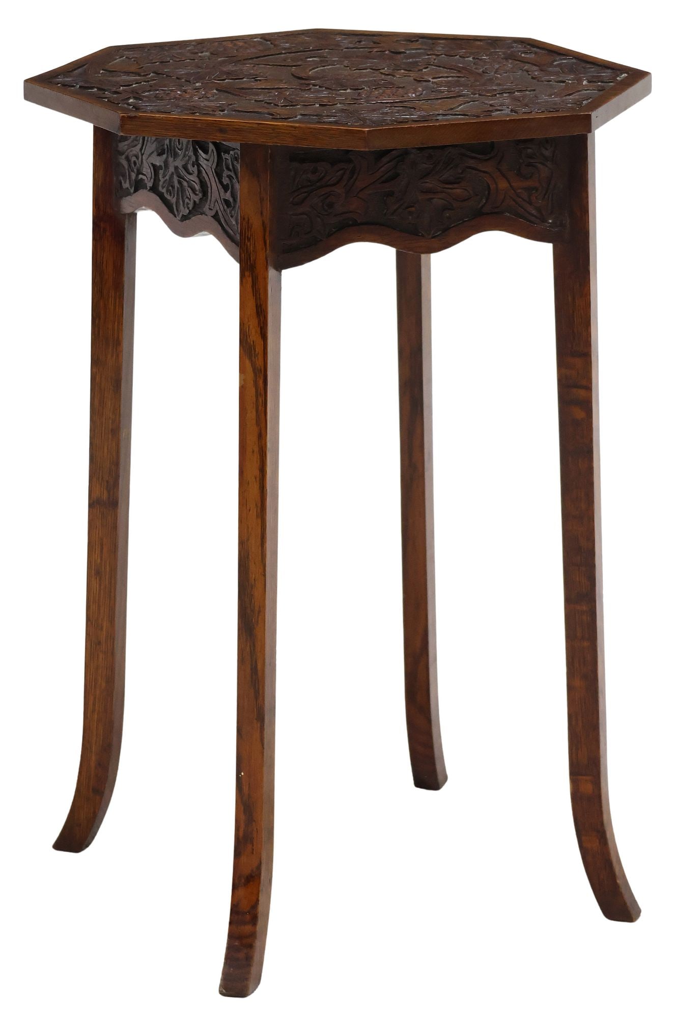 ENGLISH ARTS & CRAFTS CARVED OAK LAMP TABLE: English Arts and Crafts oak side table, early 20th c., octagonal top carved with trailing berried vine, on outswept legs, approx 26.75"h, 18.25"w, 17.75"d