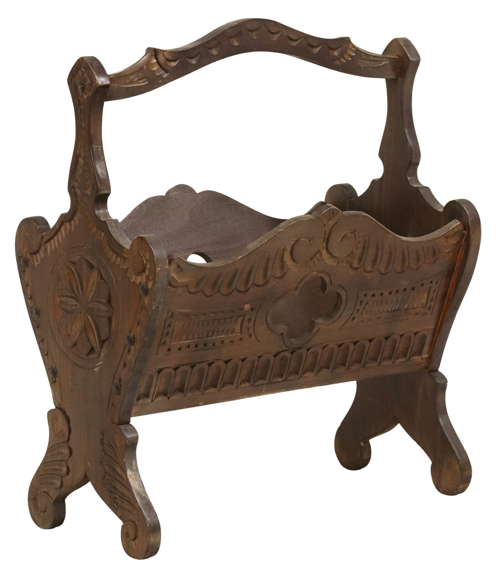 FRENCH CARVED WALNUT MAGAZINE RACK: French carved walnut magazine rack, 20th c., having arched handle, over tapered sides with pierced quatrefoils, carved with scrollwork, floral medallions, and geometric designs, approx 21"h, 18.2