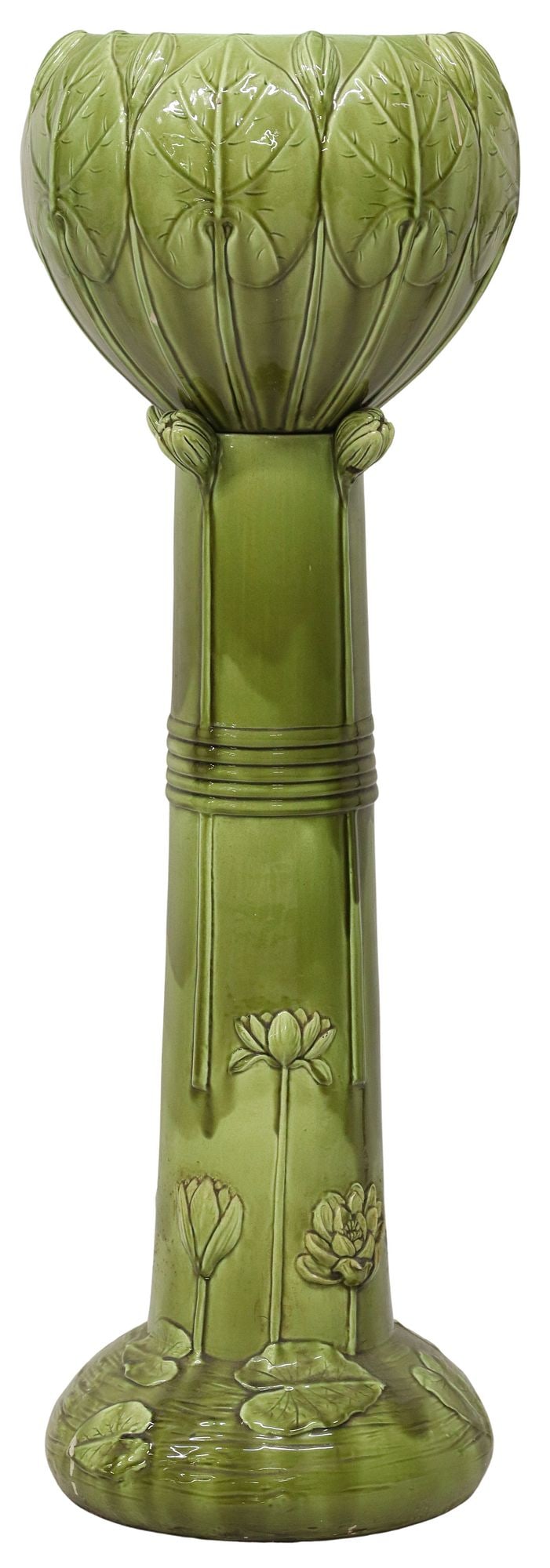 FRENCH ART NOUVEAU MAJOLICA LOTUS JARDINIERE ON STAND: French Art Nouveau tin-glazed earthenware jardiniere/ planter on stand, Pierre Perret, successor of J. Massier Fils (Jerome Massier, 1850-1916), Vallauris, early 20th c., in a tonal green glaze, havin