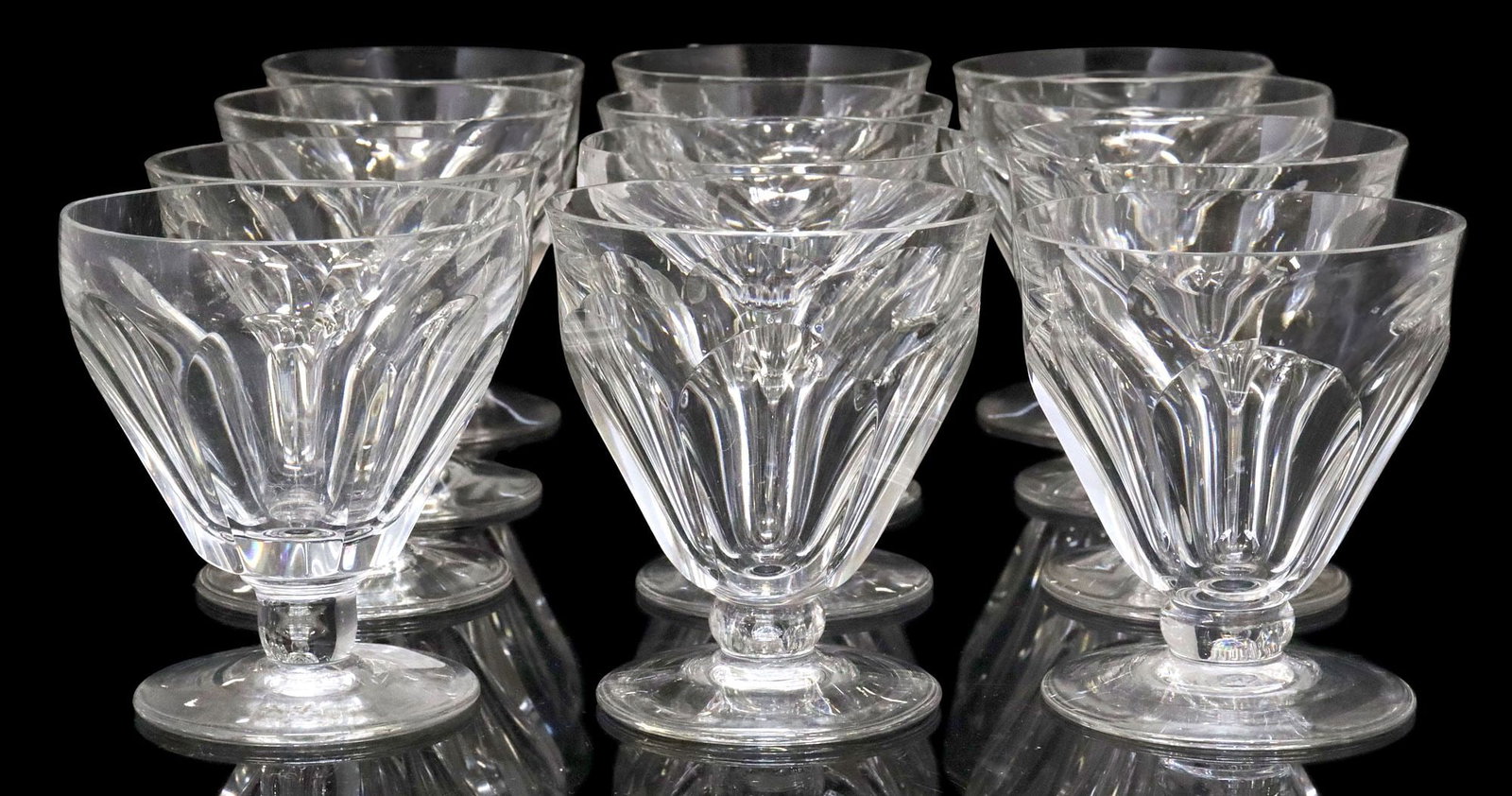 (12) BACCARAT 'TALLYRAND' & 'BRETAGNE' CUT CRYSTAL WHITE WINE GLASSES: (lot of 12) French Baccarat cut crystal white wine stems, each with paneled bowl, on circular foot, acid-etched maker's mark underfoot, including: (9) in the "Tallyrand" pattern, approx 