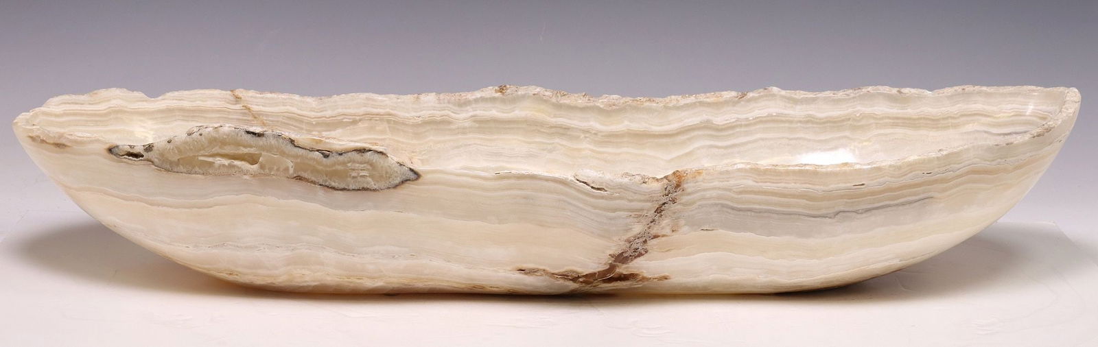 LARGE GEOLOGICAL NATURAL EDGE ONYX BOWL, 28"L (1 of 3)