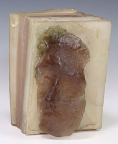 STELLA WAITZKIN (1920-2003) MODERNIST CAST RESIN SCULPTURE, BUST ON BOOK