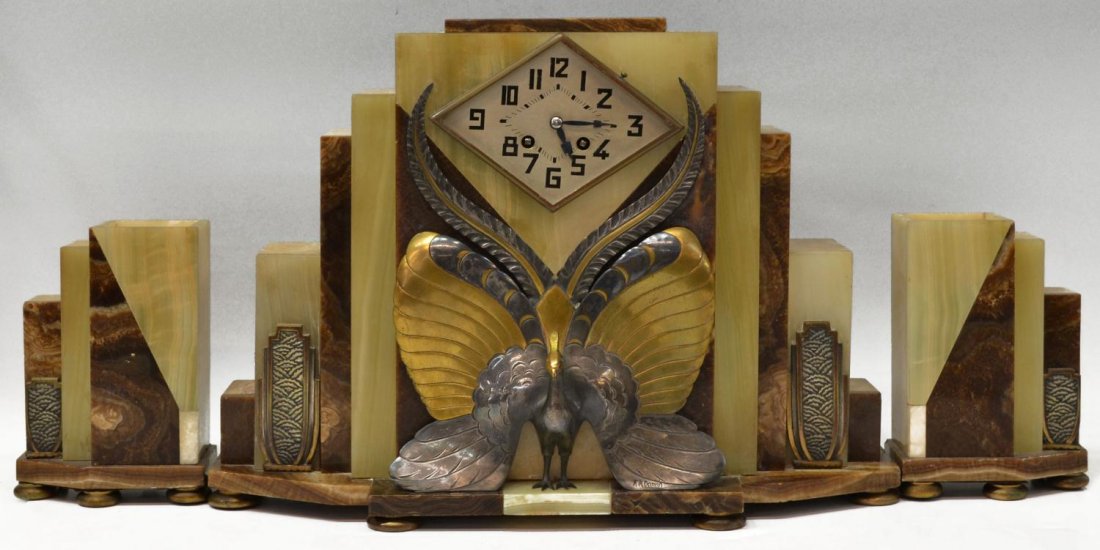 FRENCH ART DECO ONYX PEACOCK GARNITURE CLOCK SET: (set of 3) French Art Deco onyx garniture clock set, the clock of stepped design signed lower right F.H. Danvin, adorned with a central parcel gilt metal peacock, lacking bell, approx. clock: 13.75"h,