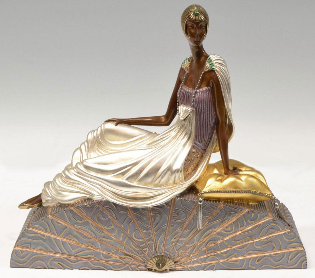 ART DECO STYLE BRONZE, KINGS FAVORITE, AFTER ERTE: Art Deco style polychrome and parcel gilt bronze, a limited edition, 'King's Favorite', after Erte (Romain de Tirtoff, Russian/French, 1892-1990), female figure reclining on a gilt pillow, numbered 16
