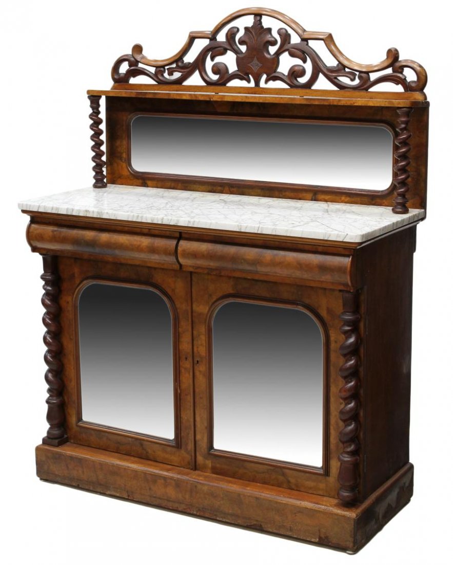 WILLIAM IV MAHOGANY MIRRORED SERVER SIDEBOARD: Mahogany William IV mahogany burlwood server or chiffonier, England, mid 19thc., having a pierced foliate cornice over the mirrored back with twist supports, the marble top cabinet with two drawers ov