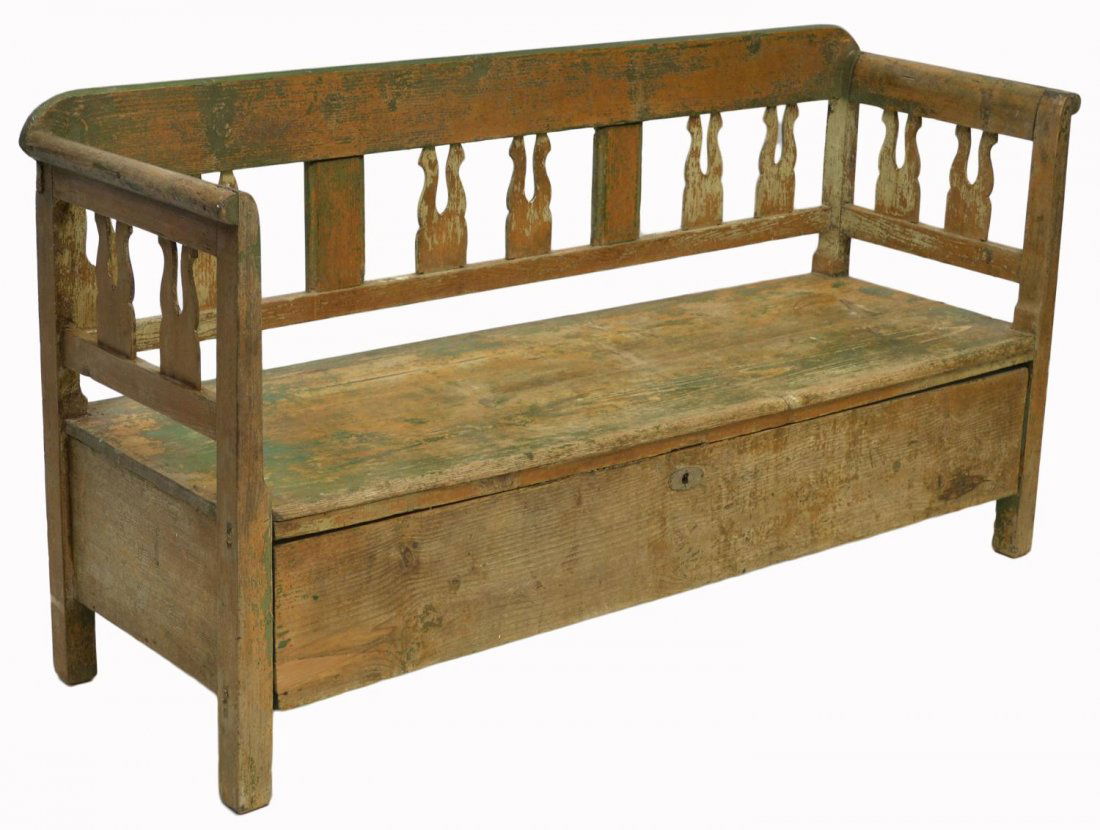 DANISH ANTIQUE PRIMITIVE PINE SETTLE: Antique primitive pine settle, Denmark, 19th c., in worn green paint, the crest rail and arms with open shaped supports, over the long bench seat, a lower full width drawer with original lock, substan