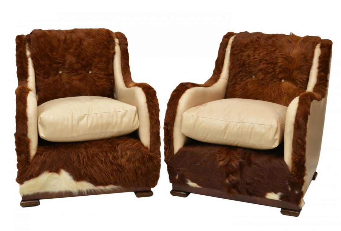 (PAIR) ITALIAN ART DECO LEATHER & COWHIDE CHAIRS: (pair) Italian Art Deco chairs recently upholstered in cream color leather and brown cowhide, one cushion with small loss to leather, 34"h, 28"w, 31"d Start Price: $600.00