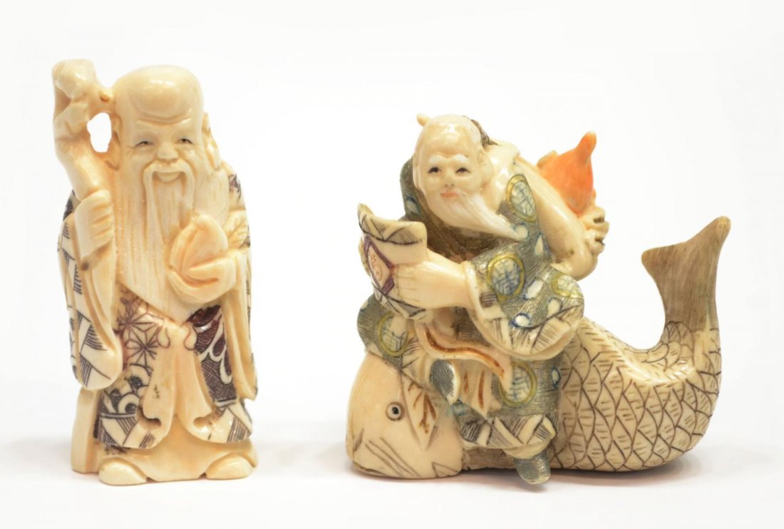 (2) ASIAN CARVED & STAINED FIGURAL IVORY NETSUKE: **This lot will not be shipped Internationally**(lot of 2) Asian figural carved ivory netsuke, comprising: (1) Chinese sage on fish, approx. 1.75"h, 2"w; (1) Chinese immortal Fukurokujin, approx. 2"h,