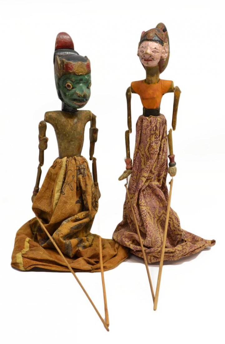 (PAIR) VINTAGE BALINESE CARVED WOOD SHADOW PUPPETS: (pair) Bali carved wood shadow puppets, the jointed figures having polychrome decoration and clothing, elaborate facial masks, one with removable head, largest: 20"h, 3.75lbs total Start Price: $50.00