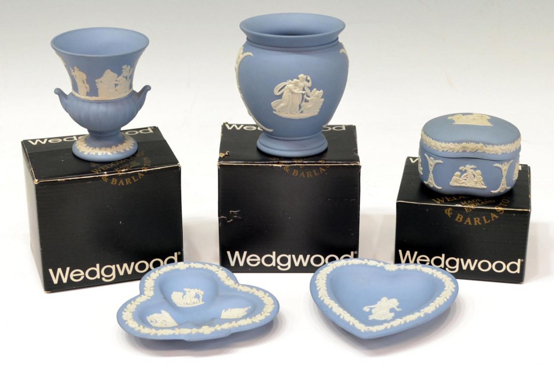 (5) COLLECTION OF WEDGEWOOD BLUE JASPER ITEMS: (lot of 5) Group of Wedgewood blue jasperware dresser articles, classical figural scenes with foliate patterns on a pale blue ground, comprising: (2) trays of heart and clover shape, (1) miniature vas