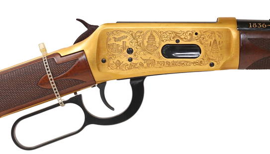 WINCHESTER TEXAS COMM. SADDLE RING CARBINE, 1895-1996, LIKE NEW: Winchester Texas Sesquicentennial Model 94 Saddle Ring Carbine, 1886-1986, lever action, .38-55 caliber, unfired, 18.5" round barrel joined by a gilt band above the tubular magazine, blade front