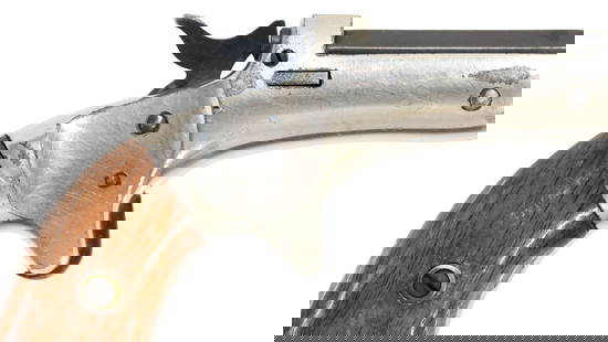 STEVENS TIP UP NO. 41 .22 CALIBER PISTOL: Stevens Tip Up No. 41 pistol, .22 caliber, 3.5" barrel, blade front sight, grooved rear sight on recoil shield, nickel finish on iron frame, hardwood grips, two matched serial numbers, action