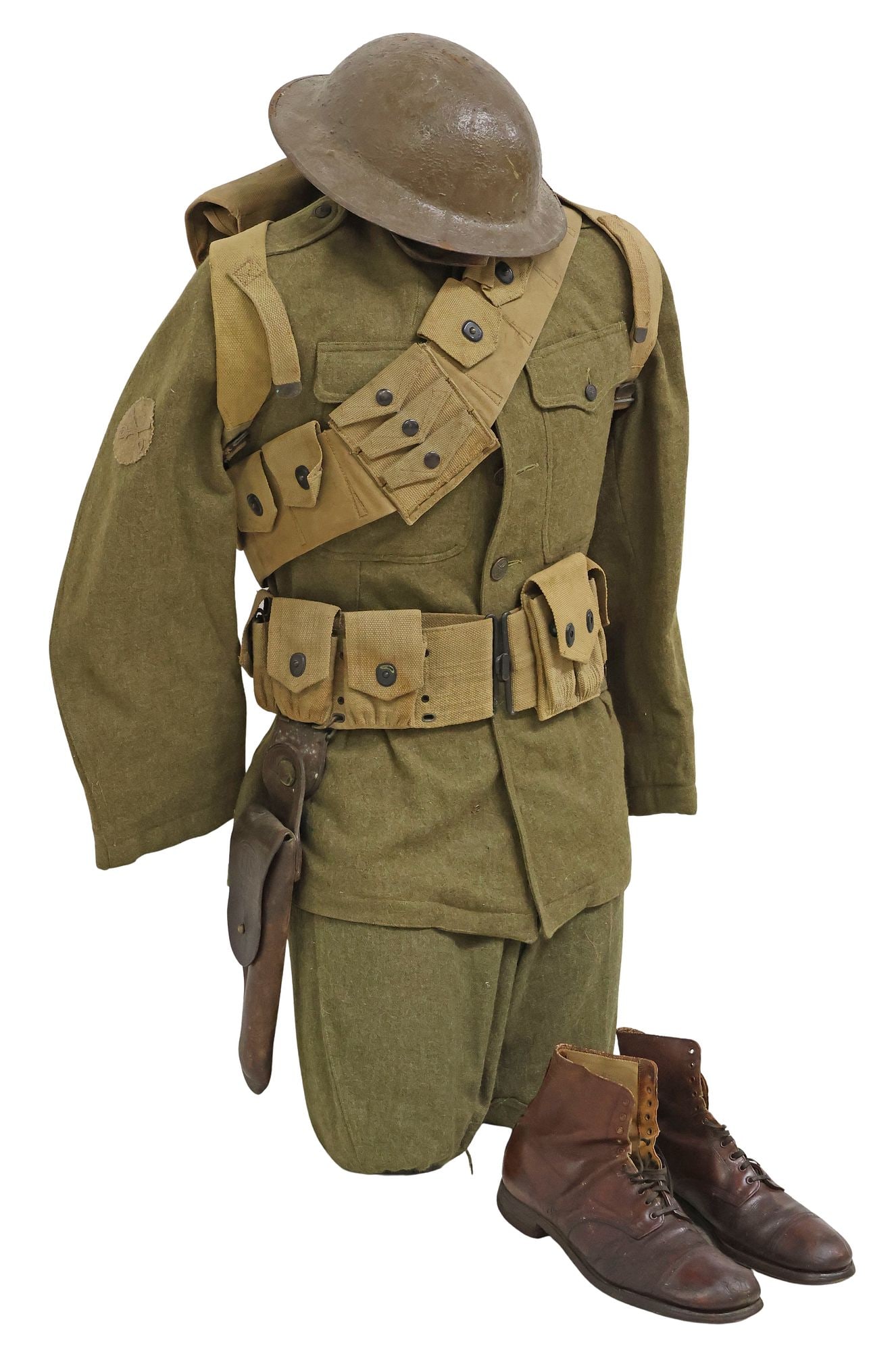(4) U.S. WWI CAVALRY UNIFORM & ACCOUTREMENTS: U.S. WWI Uniform & Accoutrements, likely assembled, most mounted on a mannequin and not examined off the mannequin, includes a 3rd Infantry Division Brodie helmet with chin strap and lin