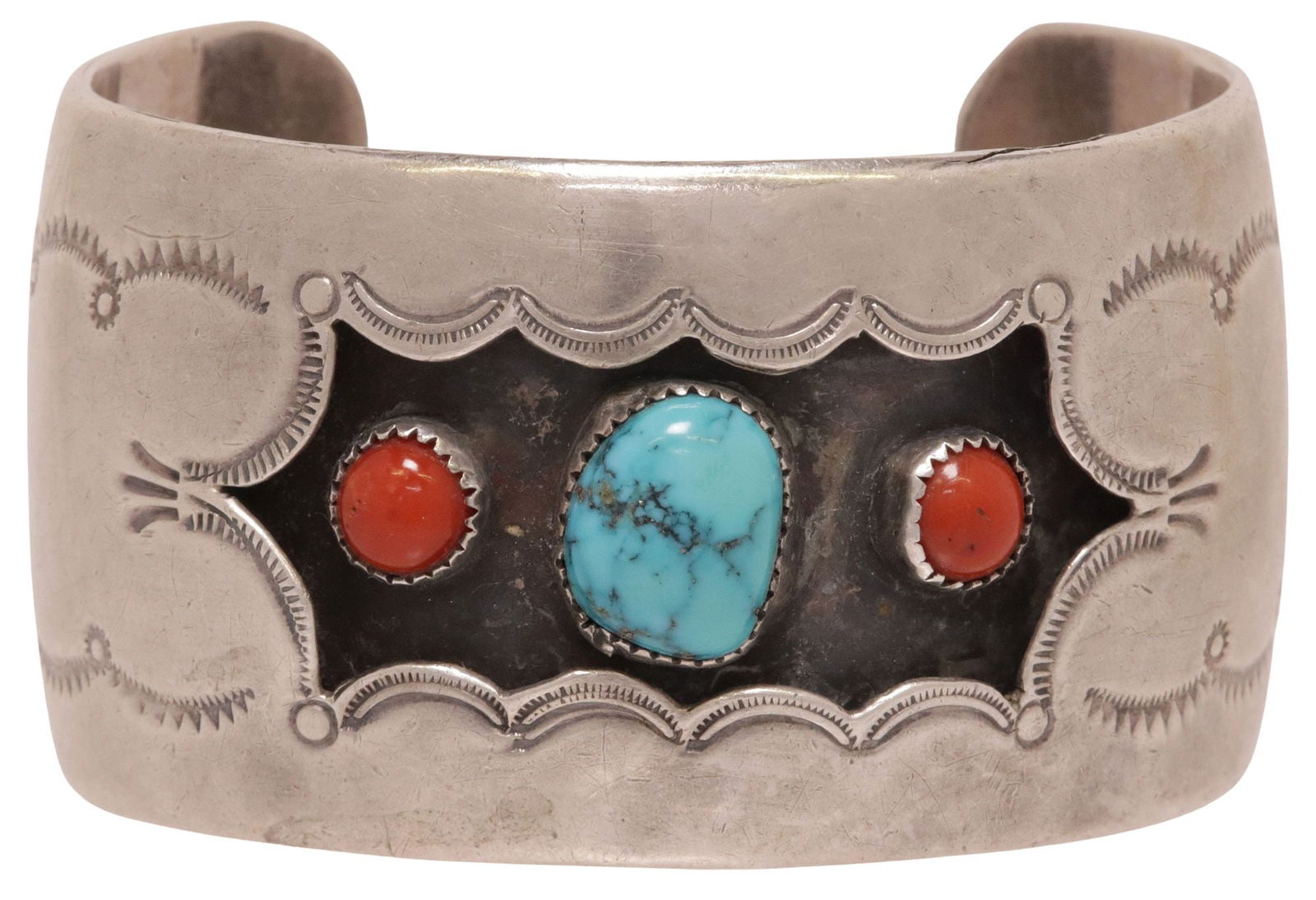 NATIVE AMERICAN SILVER TURQUOISE & CORAL SHADOWBOX CUFF: Native American silver (content unknown) shadowbox cuff, stamp work designs centering cabochon turquoise and red coral, engraved signature Violet Devore (?), 0.5" narrow split to one edge of cuff