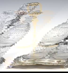 GEORGIAN STYLE SILVERPLATE THREE-BOTTLE DECANTER STAND: Georgian style silverplate decanter stand, central handle, trefoil-shaped base, three glass bottles and stoppers cut with bands of paneled, diamond, dot and fluted patterns, apparently unmarked,&
