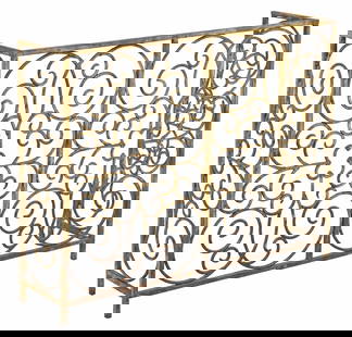 LARGE SCROLLED GILT IRON FIREPLACE SCREEN: Large gilt iron fireplace screen, 20th c., openwork scrolled frame with quatrefoil motifs, approx 28.5"h, 37"w, 9 3/8"d