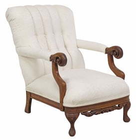 CARVED MAHOGANY BUTTON BACK LIBRARY ARMCHAIR