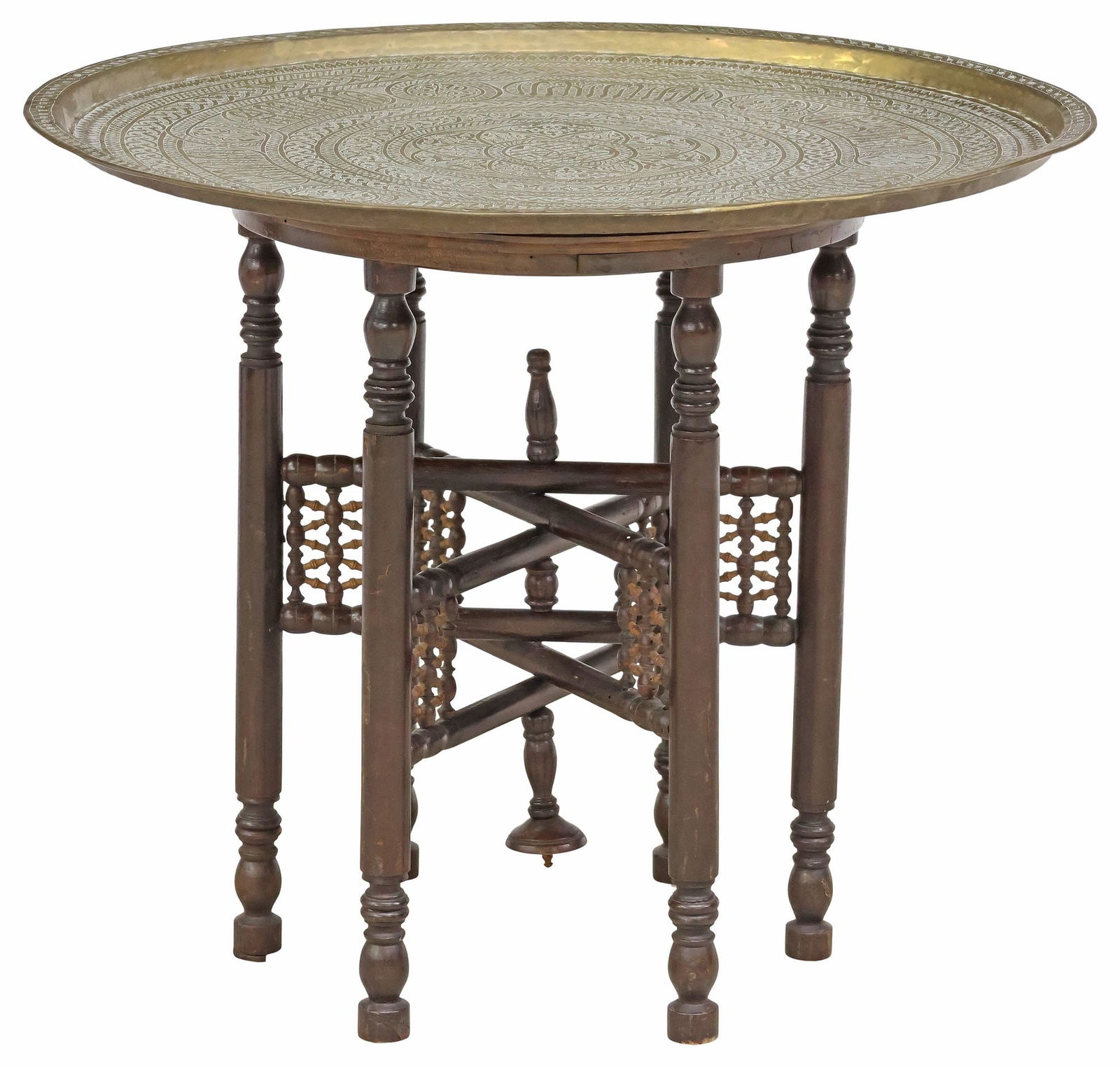 LARGE ARABESQUE ENGRAVED BRASS TRAY ON TABLE BASE: Large Middle Eastern brass tray table, 20th c., assembled, the tray with shallow basin, chased arabesque geometrics and elaborate engraved foliate motifs, and Arabic calligrap