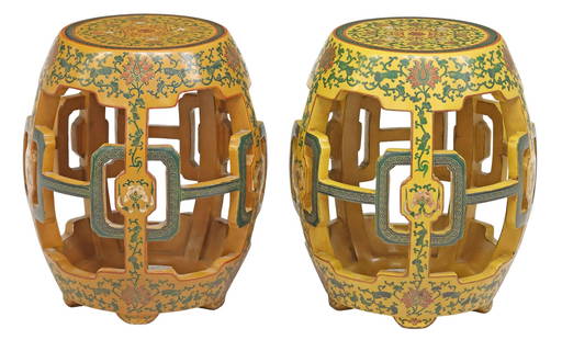 (2) CHINESE TIANQI LACQUER OPENWORK GARDEN SEATS: (pair) Chinese tianqi lacquered wood garden seats, with slightly mismatched shades of yellow lacquered ground, pierced barrel-form with incised lotus scrollwork, in-filled polychrome decorat