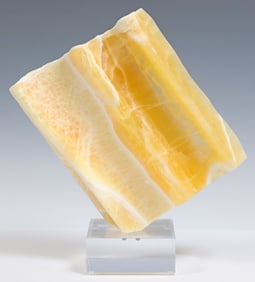 GEOLOGICAL HONEYCOMB CALCITE SPECIMEN ON ACRYLIC BASE