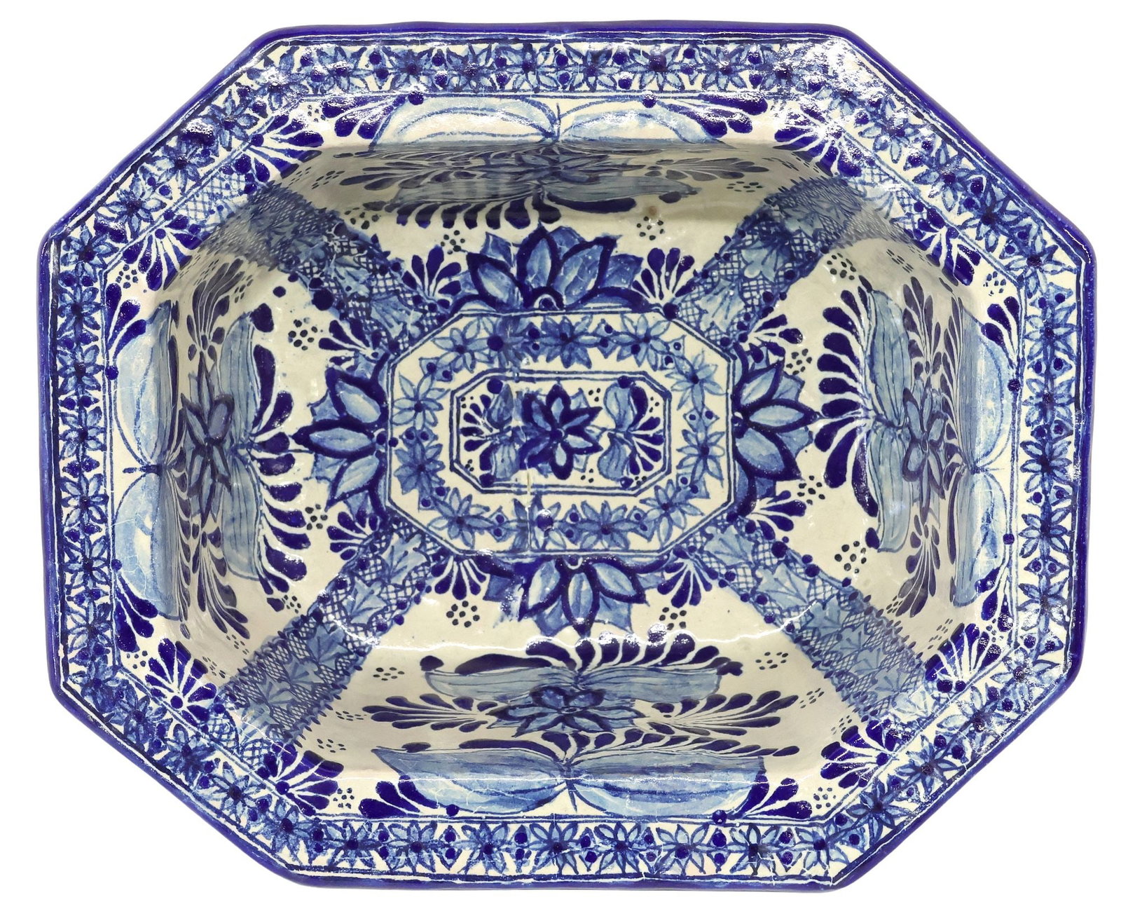 CASA GUEVARA PUEBLA MEXICO TALAVERA POTTERY BOWL: Talavera pottery bowl/ basin, Casa Guevara, Puebla, Mexico, octagonal form, blue glazed floral decoration, approx 5.25"h, 14.5"w, 12"d, 5.25lbs **Provenance: From the estate of Connie T