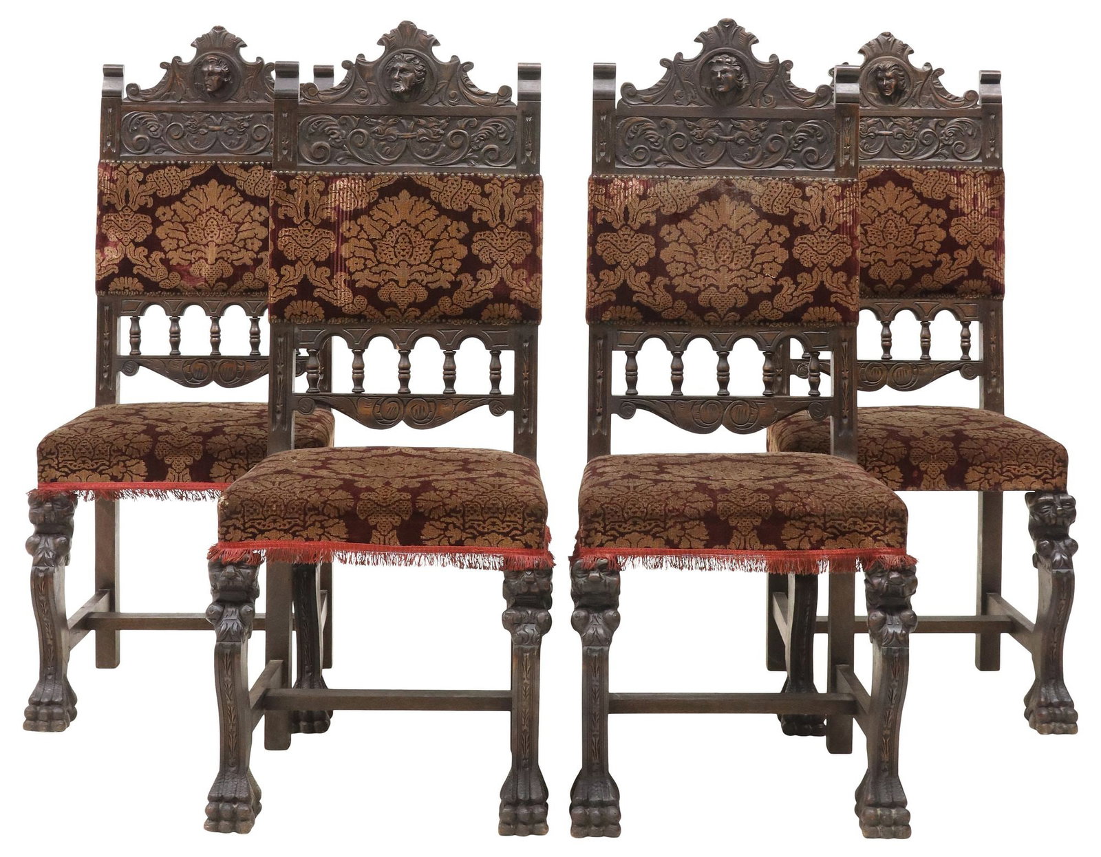 (4) SPANISH RENAISSANCE REVIVAL UPHOLSTERED WALNUT CHAIRS: (lot of 4) Spanish Renaissance Revival carved walnut side chairs, early 20th c., each having scrolled crest with portrait roundel, over scrollwork frieze, lower back with arcaded balustrade, back and 