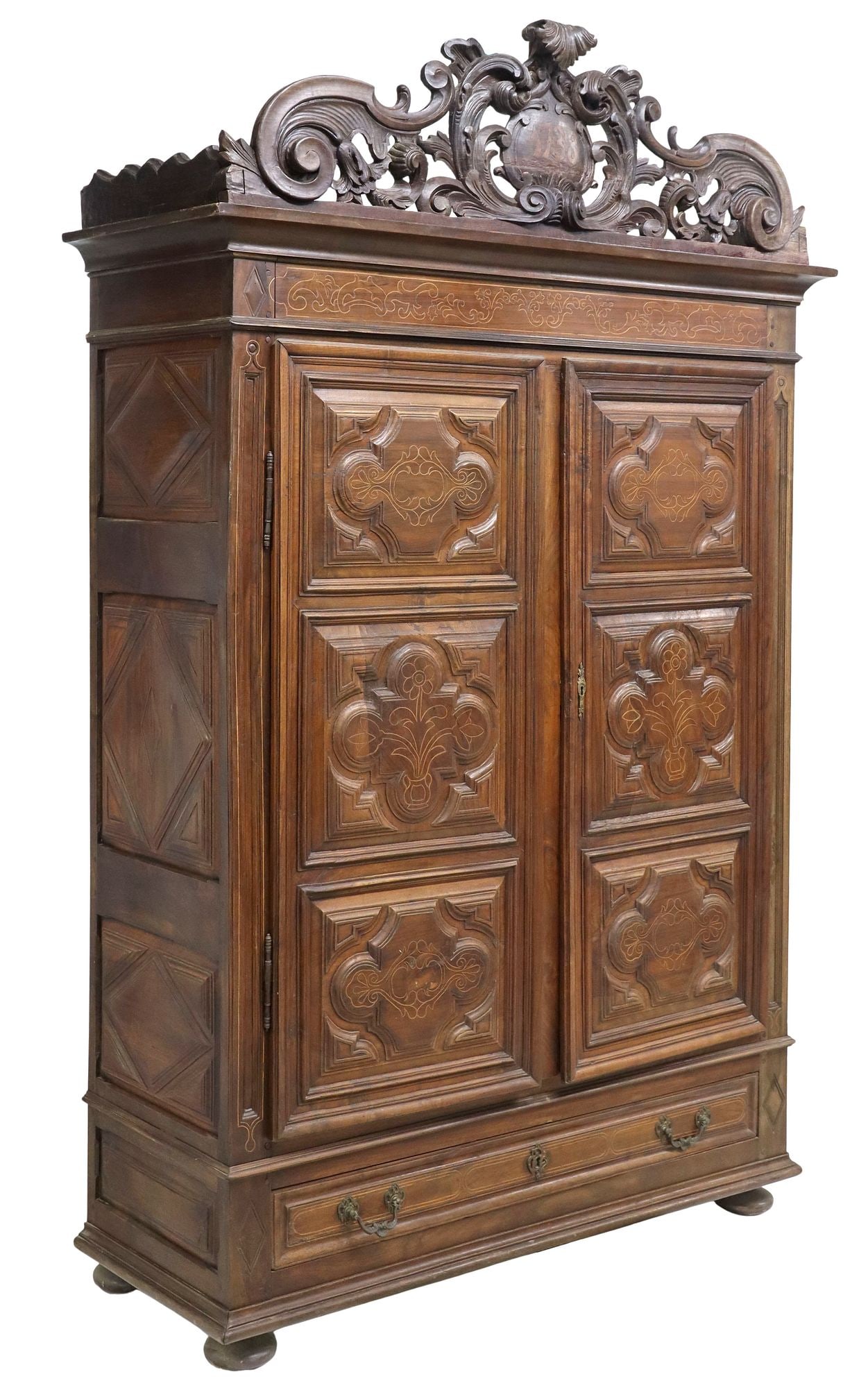 SPANISH BAROQUE WALNUT & LINE-INLAID ARMOIRE: Spanish Baroque walnut wardrobe/ armoire, 18th/ 19th c., pierced scrolling foliate crest with central roundel with inlaid 1738 year mark, over molded cornice, two cabinet doors with raised geomet