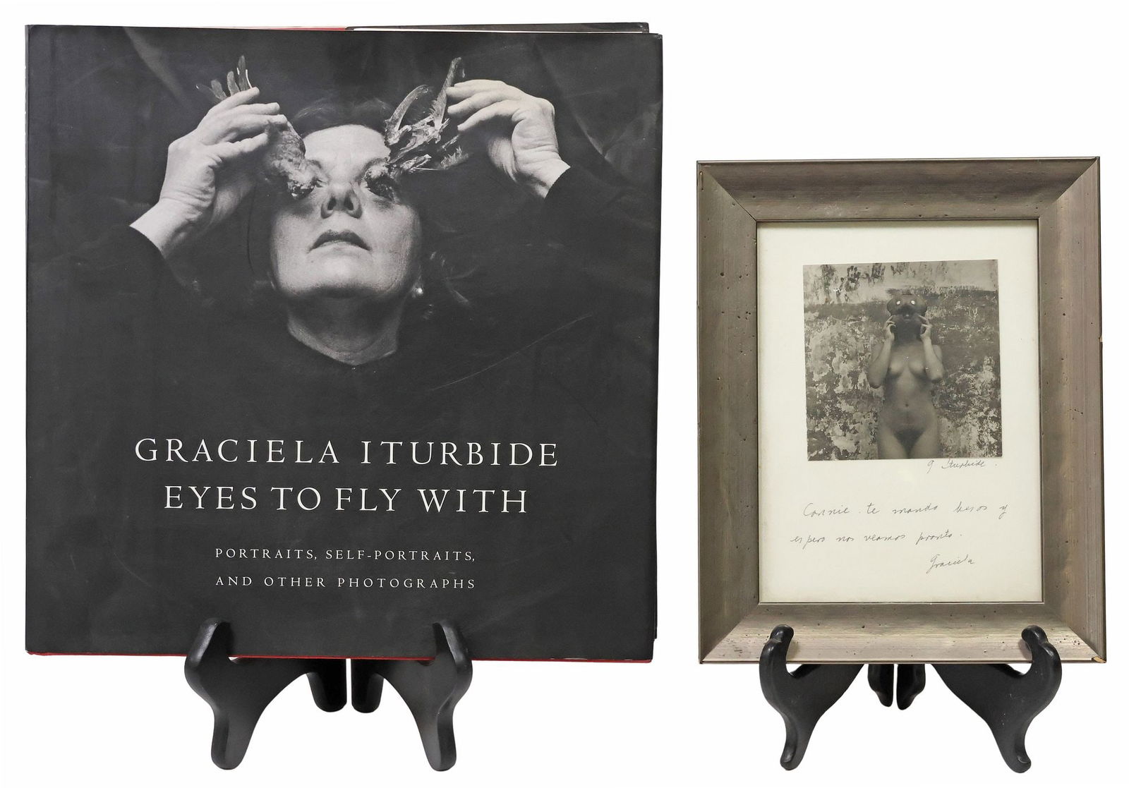 (2) GRACIELA ITURBIDE (B.1942) SIGNED GELATIN SILVER PRINT & PHOTOGRAPHY BOOK: (lot of 2) Framed photograph and photography book by Graciela Iturbide (Mexico, b.1942), including: (1) framed gelatin silver print on paper, Nude Female Portrait with Mask, paper mount signed G. Itur