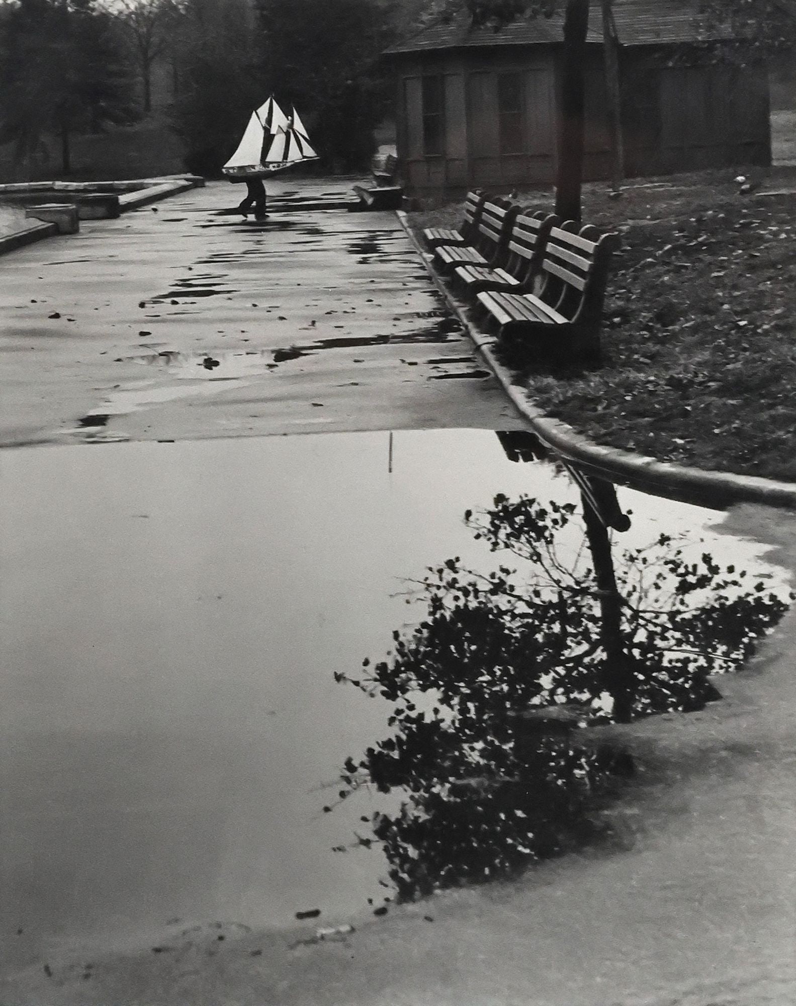 ANDRE KERTESZ (1894-1985) GELATIN SILVER PRINT 'HOMING SHIP, CENTRAL PARK, NY': Framed gelatin silver print on paper, "Homing Ship, Central Park, New York," signed verso A. Kertesz (Andre Kertesz, Hungarian-born American, 1894-1985), inscribed and dated New York 1944, l