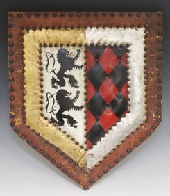 LEATHER-CLAD WALL-MOUNTED HERALDIC SHIELD WITH COAT OF ARMS