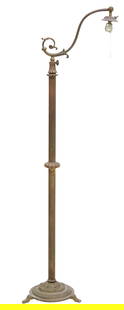 VINTAGE PATINATED METAL 1-LT BRIDGE FLOOR LAMP: Vintage patinated metal floor lamp, early 20th c., having scrolled bridge arm issuing single light, over reeded central standard, terminating on round base, rising on tripodal feet, remnants of a gilt