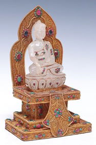 CARVED ROCK CRYSTAL BUDDHA ON GEM-ENCRUSTED FILIGREE THRONE