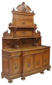 ITALIAN RENAISSANCE REVIVAL CARVED WALNUT BREAKFRONT SIDEBOARD