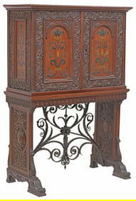 SPANISH RENAISSANCE REVIVAL LEATHER-PANELED CABINET ON STAND